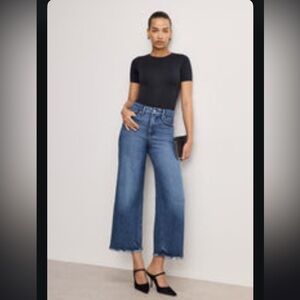 Good American Soft-tech Cropped Palazzo Jeans with Frayed Hem (Indigo 737).